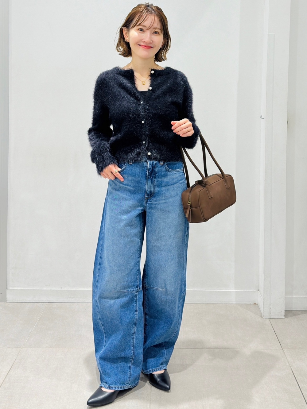 ブラフィールキャミソール、ミラノリブポロカーディガンNTQ+E」の着用