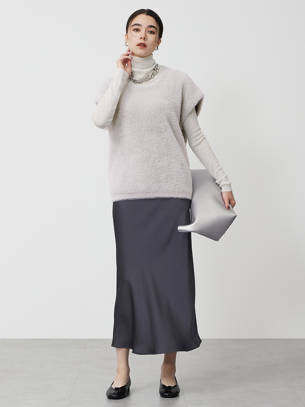 フェザーヤーンコクーンベスト