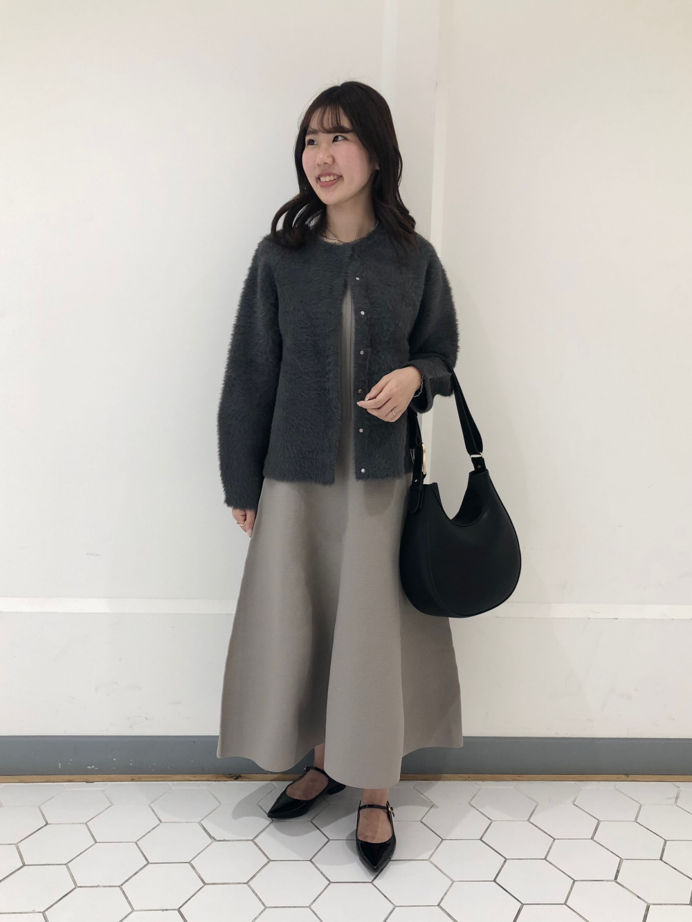 ホールガーメント®ニットフレアワンピース（長袖）」の着用