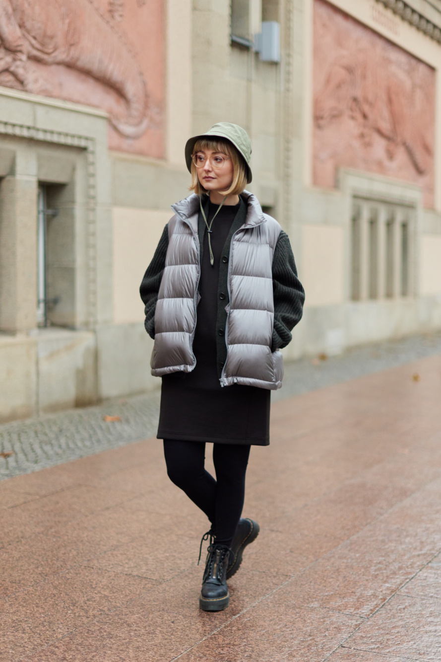 Puffer vest outlet with sweater sleeves