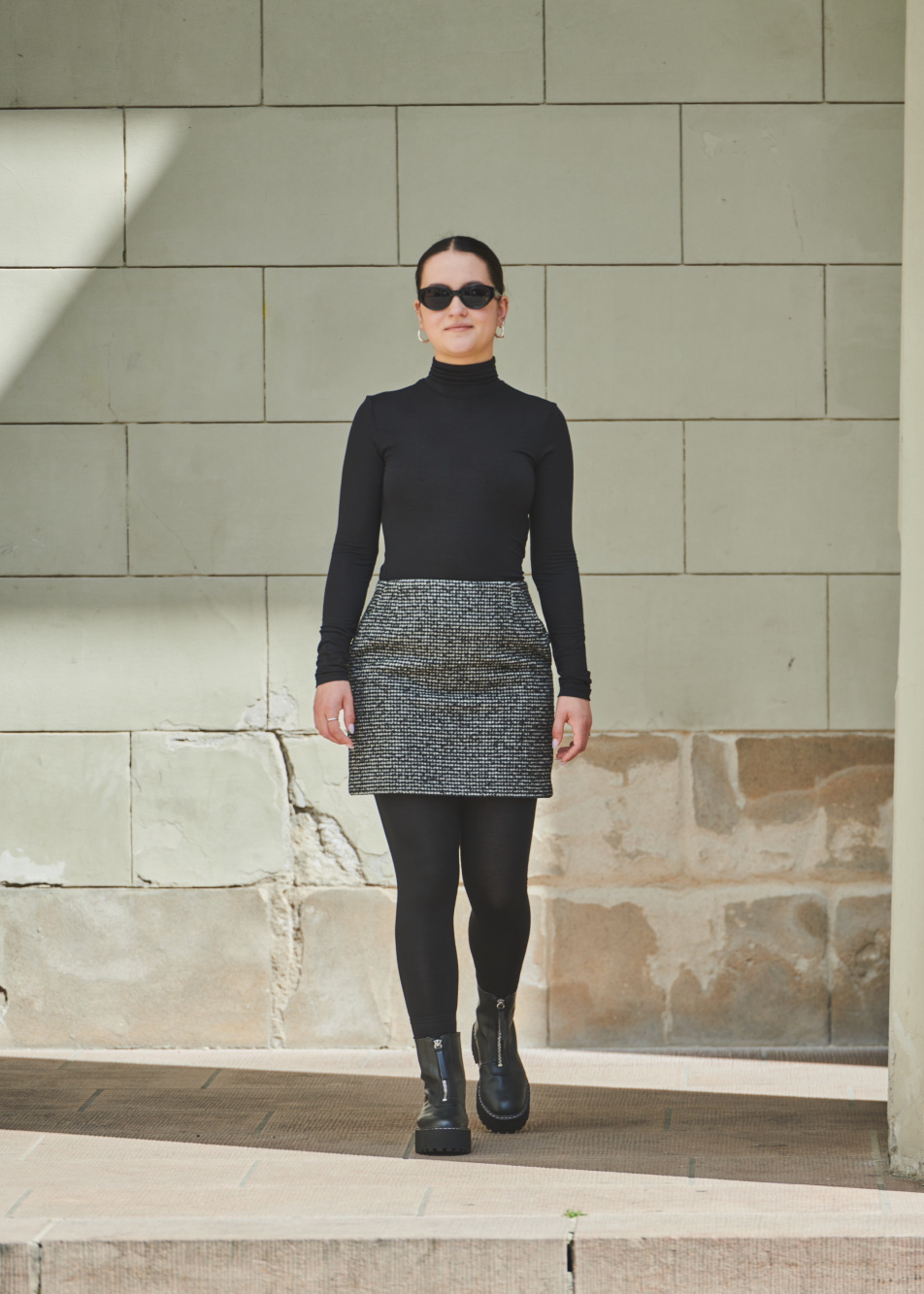 Tennis skirt, houndstooth tights and button up shirt with a black