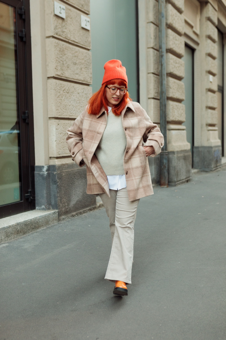 Premium Photo  Stylish woman in beige pants and sweater