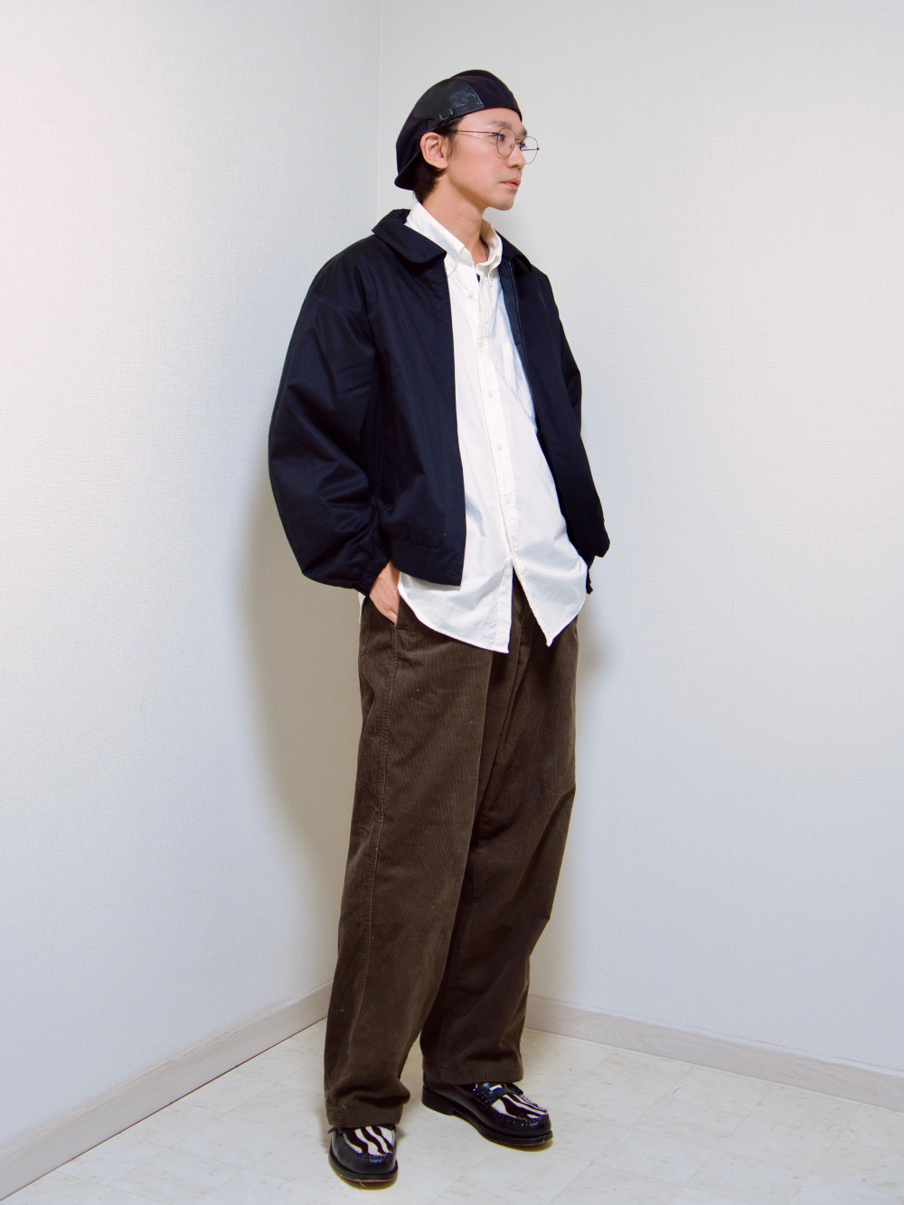 パフテックショートブルゾン、ハイネックセーター」の着用