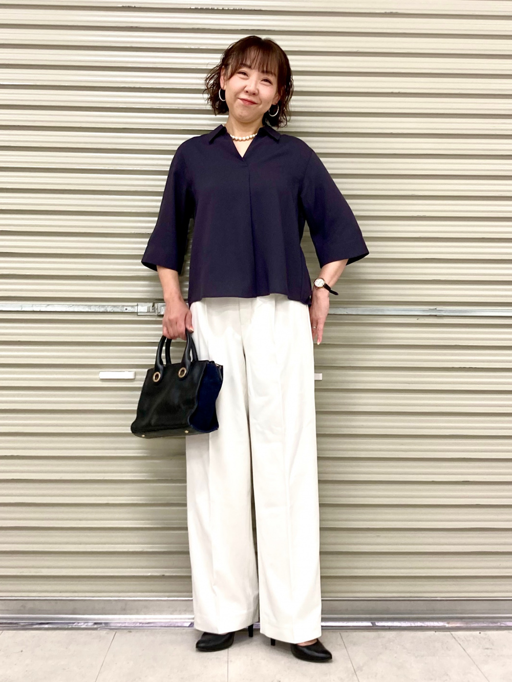 レーヨンスキッパーブラウス/7分袖、タックワイドパンツ」の着用